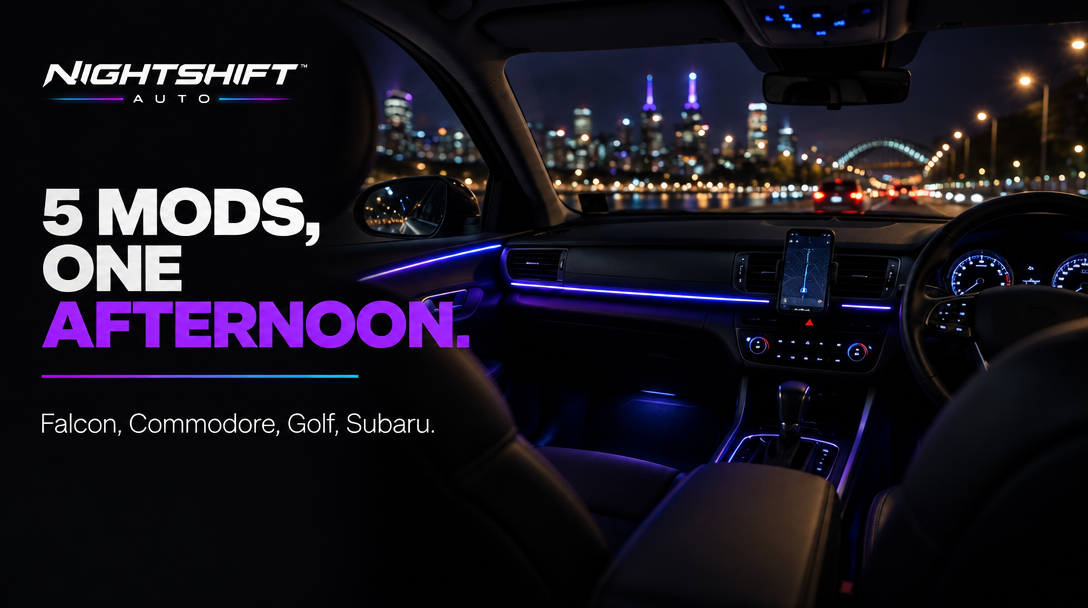 NIGHTSHIFT AUTO: 5 mods, one afternoon — a phone-mounted, blue-lit car interior with a night city skyline